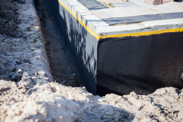 Professional Waterproofing technician working in Clinton, SC